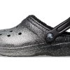 Crocs klassiska glitterfodrade träskor ”Black Silver” 205842-067