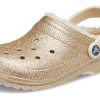 Crocs klassiska glitterfodrade träskor ”Gold” 504271